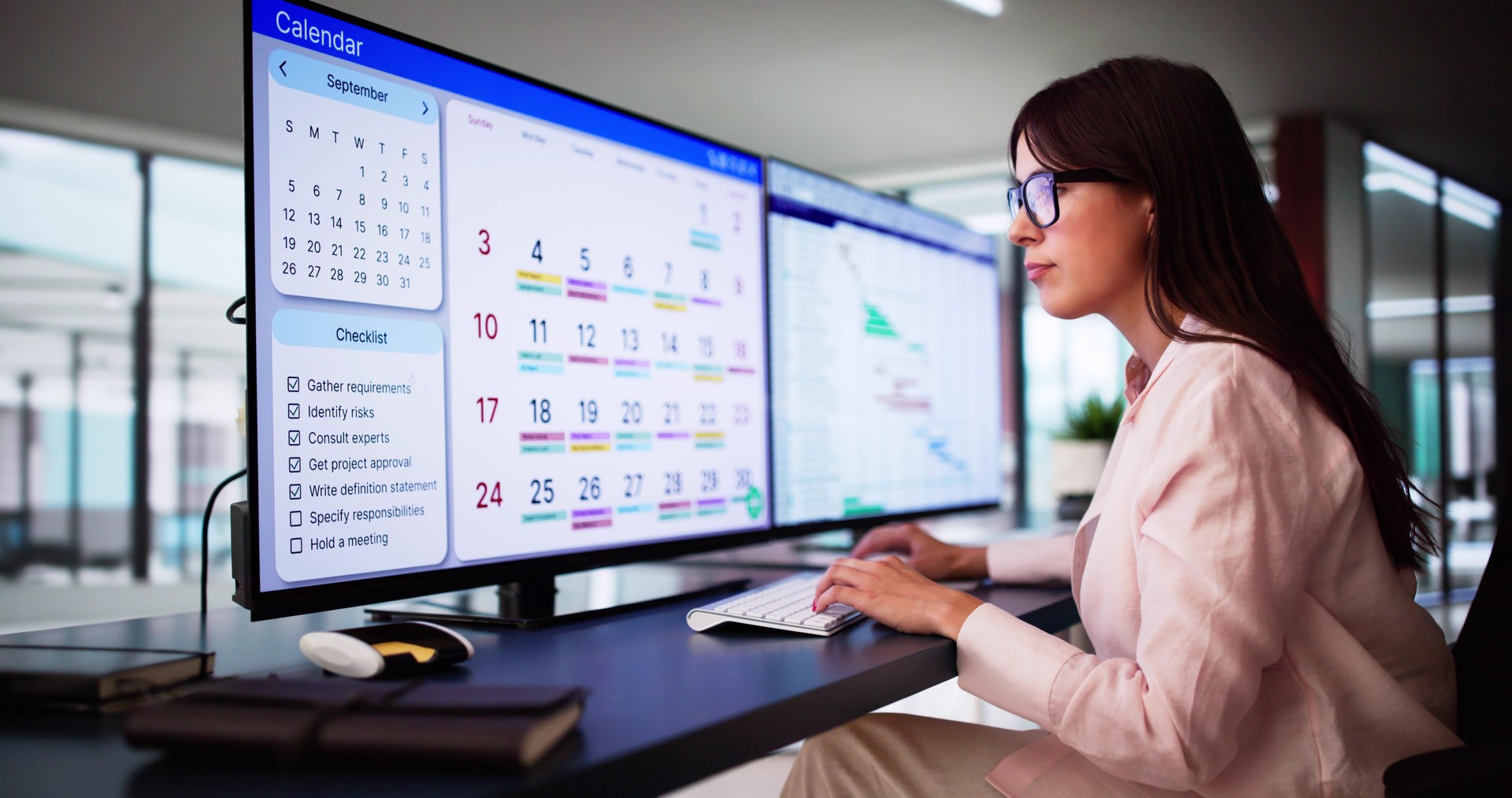 Employee Working On Calendar Schedule