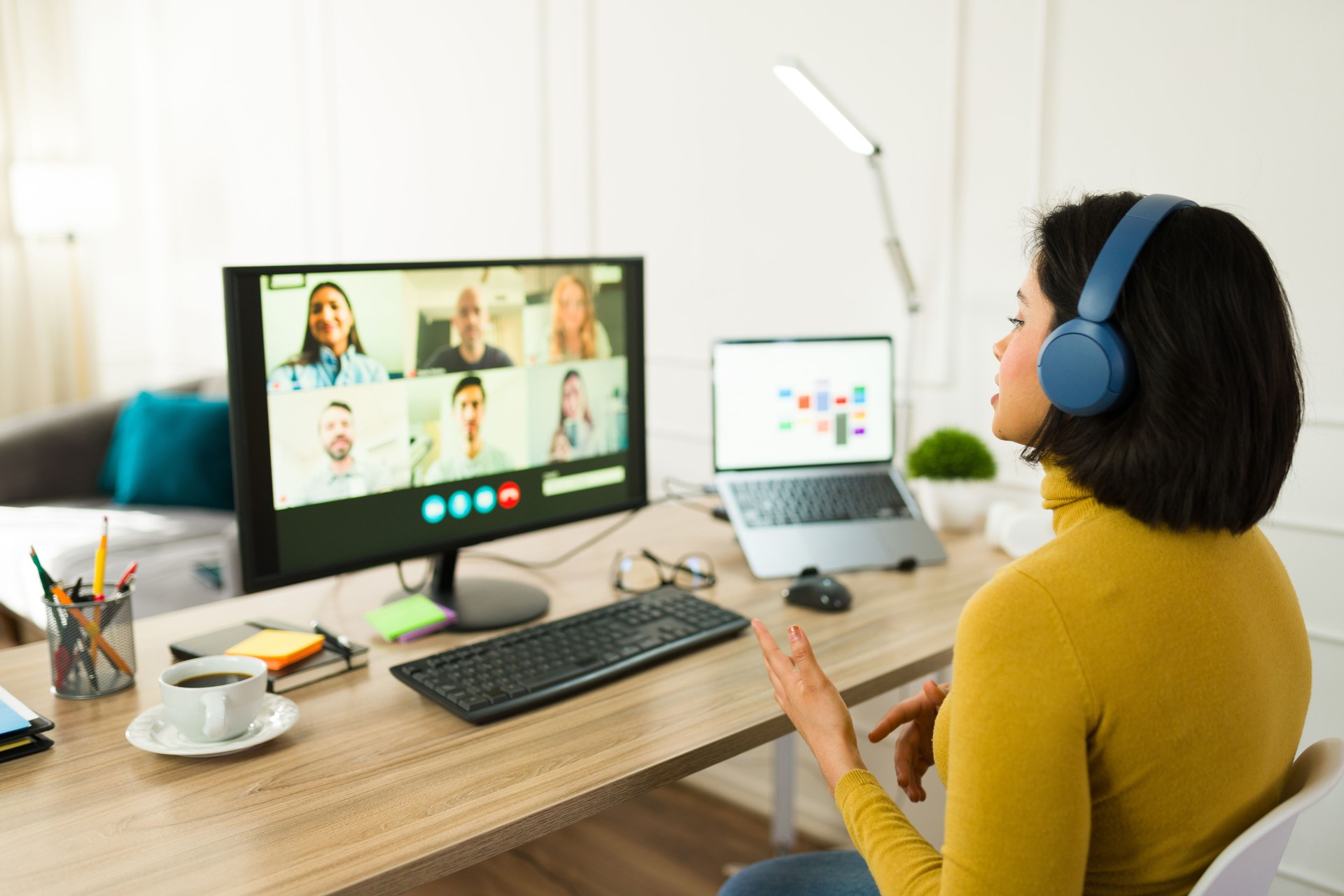 Remote professional videoconferencing with colleagues during home-based workday